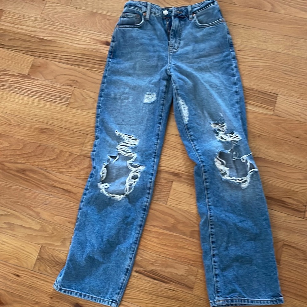 High rise, baggy/flared Ripped Jeans